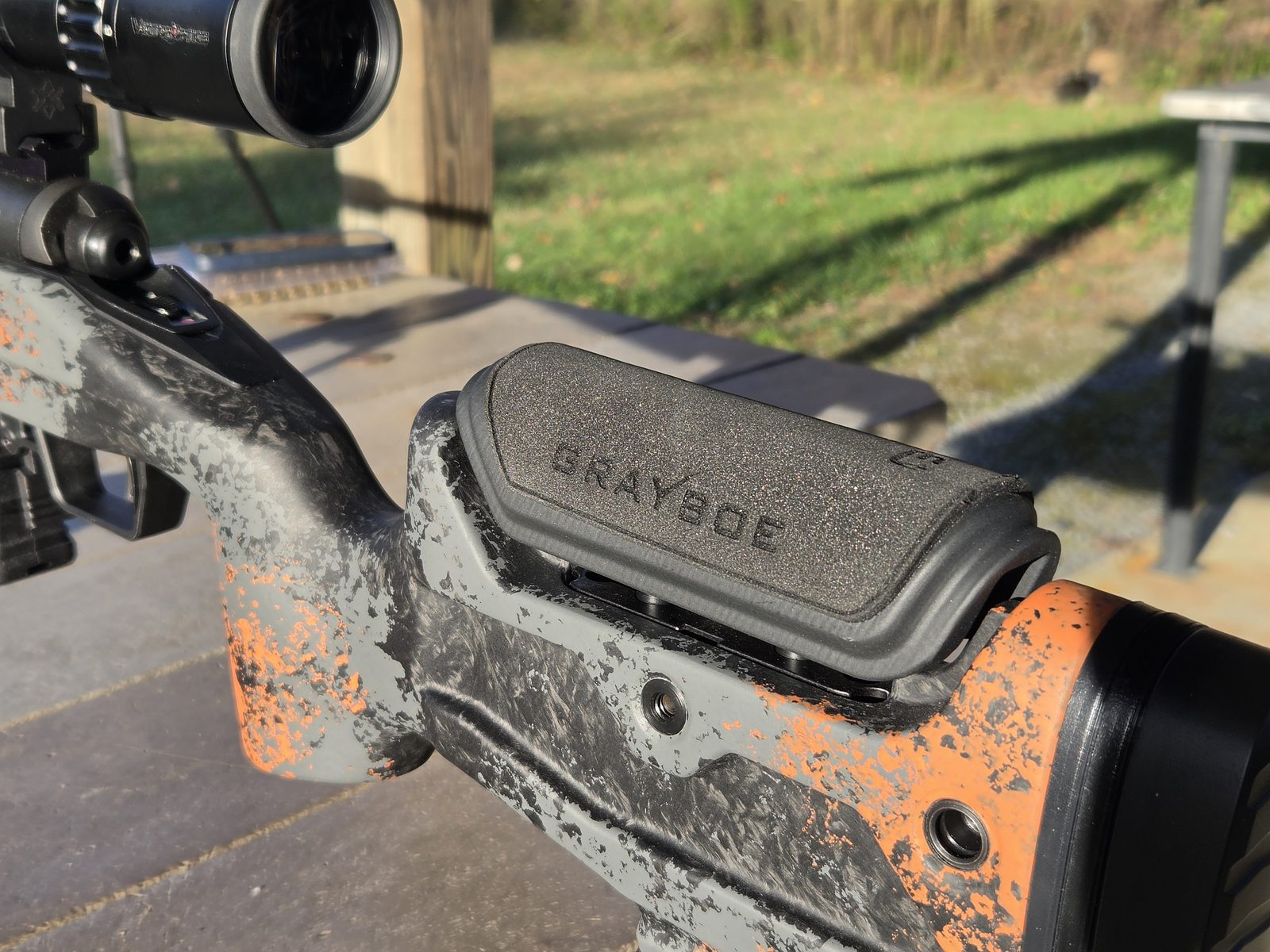 Close-up of the Grayboe Core adjustable cheek piece with the Grayboe logo