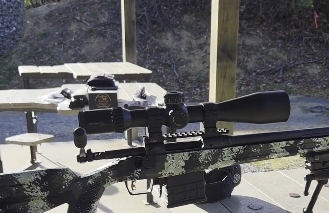 Side profile of a scoped Savage 110 Tactical in a Grayboe Flagstaff stock with AICS magazine